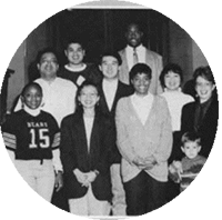 Students of color standing together in a Black and White photo from the early 1990s